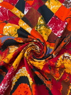 Colorful Ankara fabric with geometric pattern.